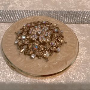 Beautiful compact with ornate detail